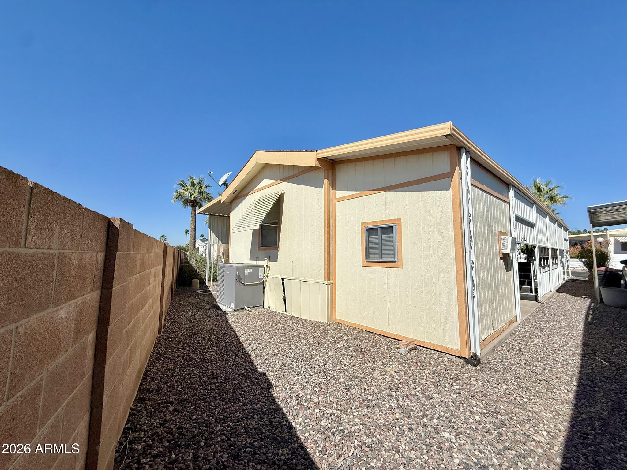 601 North Hayden Road, Unit 40 Scottsdale, AZ 85257 - Photo 32 of 48 a view of a house with a backyard