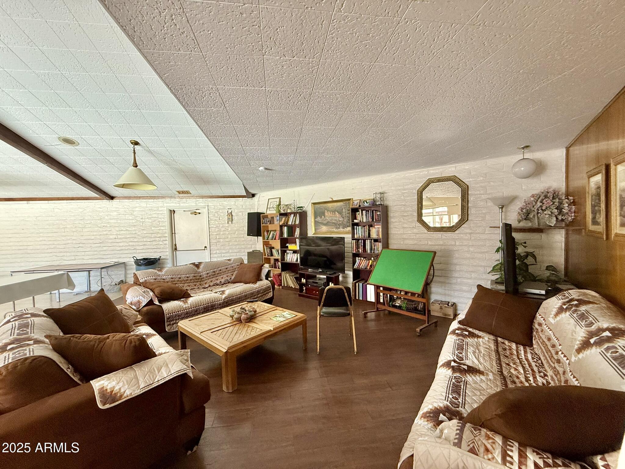601 North Hayden Road, Unit 40 Scottsdale, AZ 85257 - Photo 41 of 48 a living room with furniture and a rug
