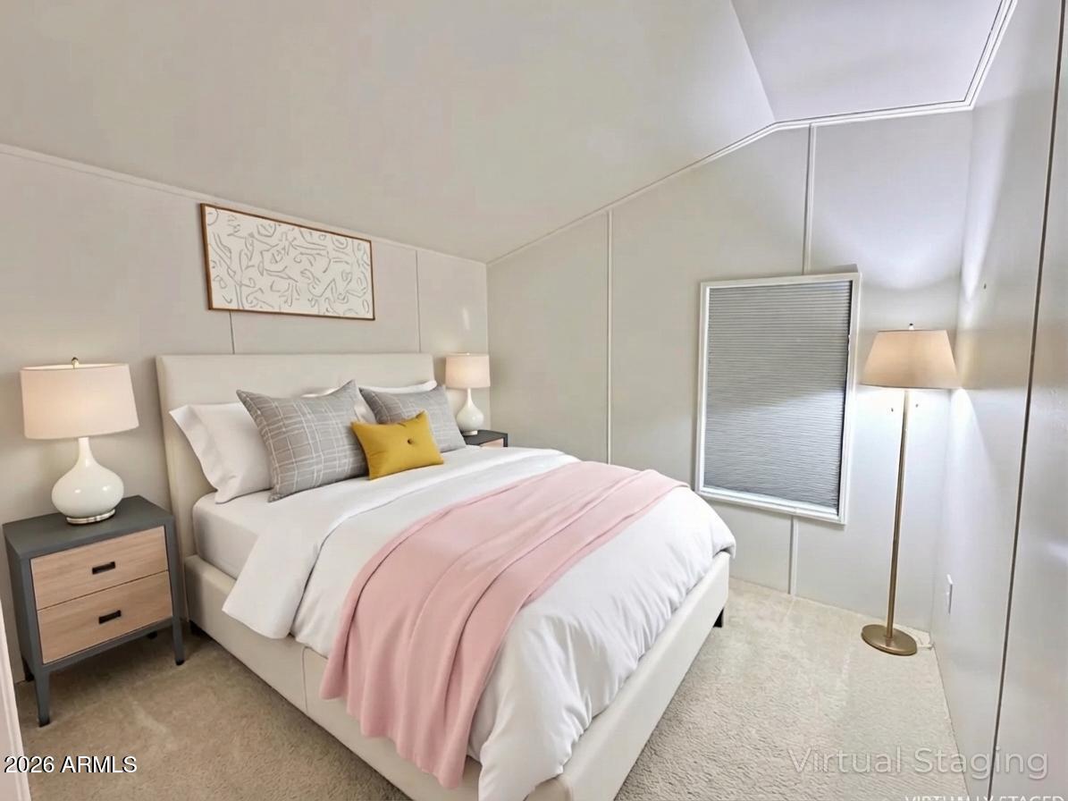 601 North Hayden Road, Unit 40 Scottsdale, AZ 85257 - Photo 5 of 48 a bedroom with a bed and wooden floor