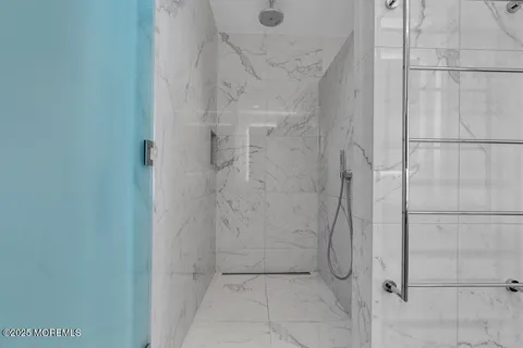 a bathroom with a toilet and a sink