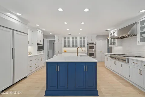 a view of a dining room with furniture and window