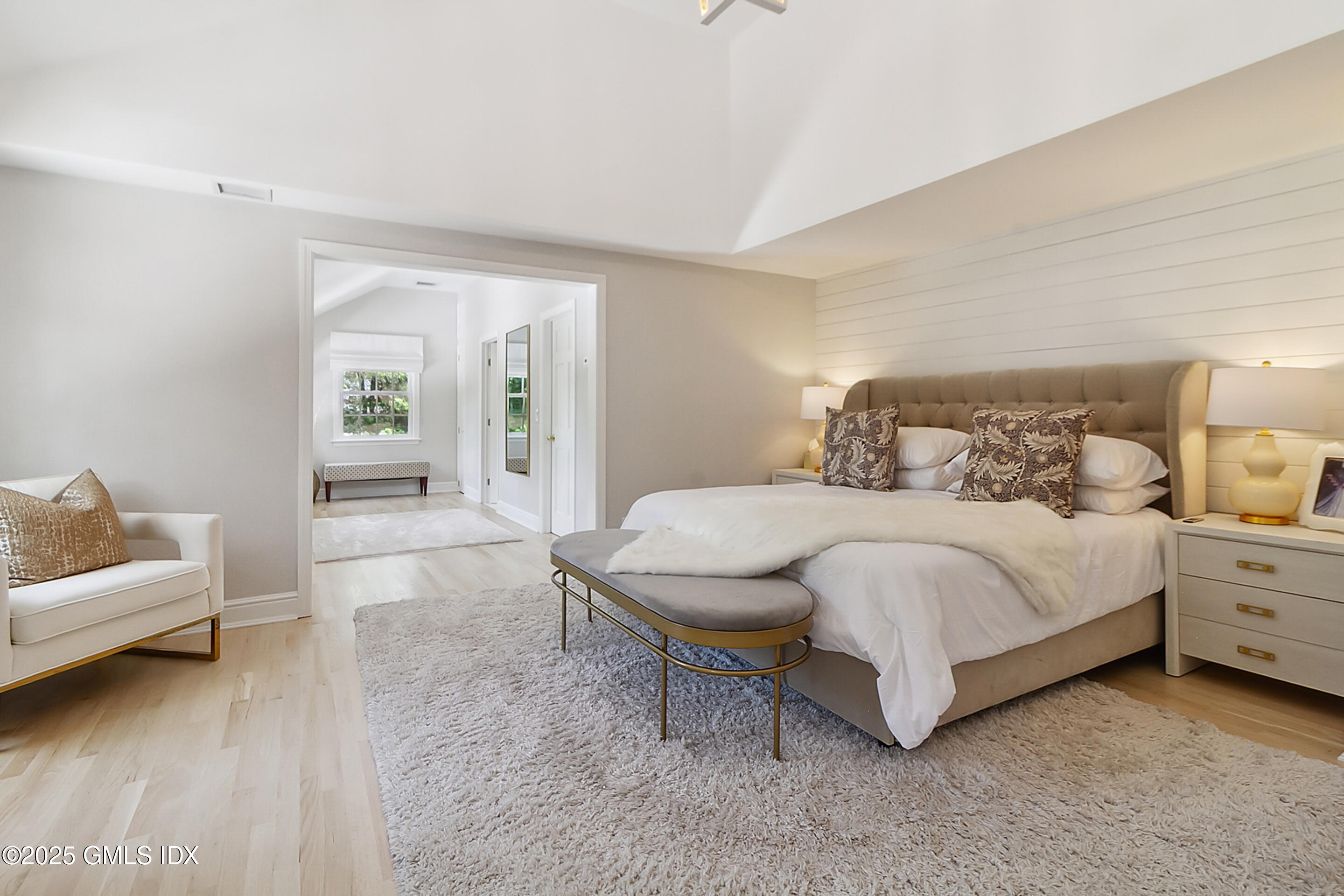 17 Will Merry Lane Greenwich, CT 06831 - Photo 28 of 49 a bedroom with a bed and a couch