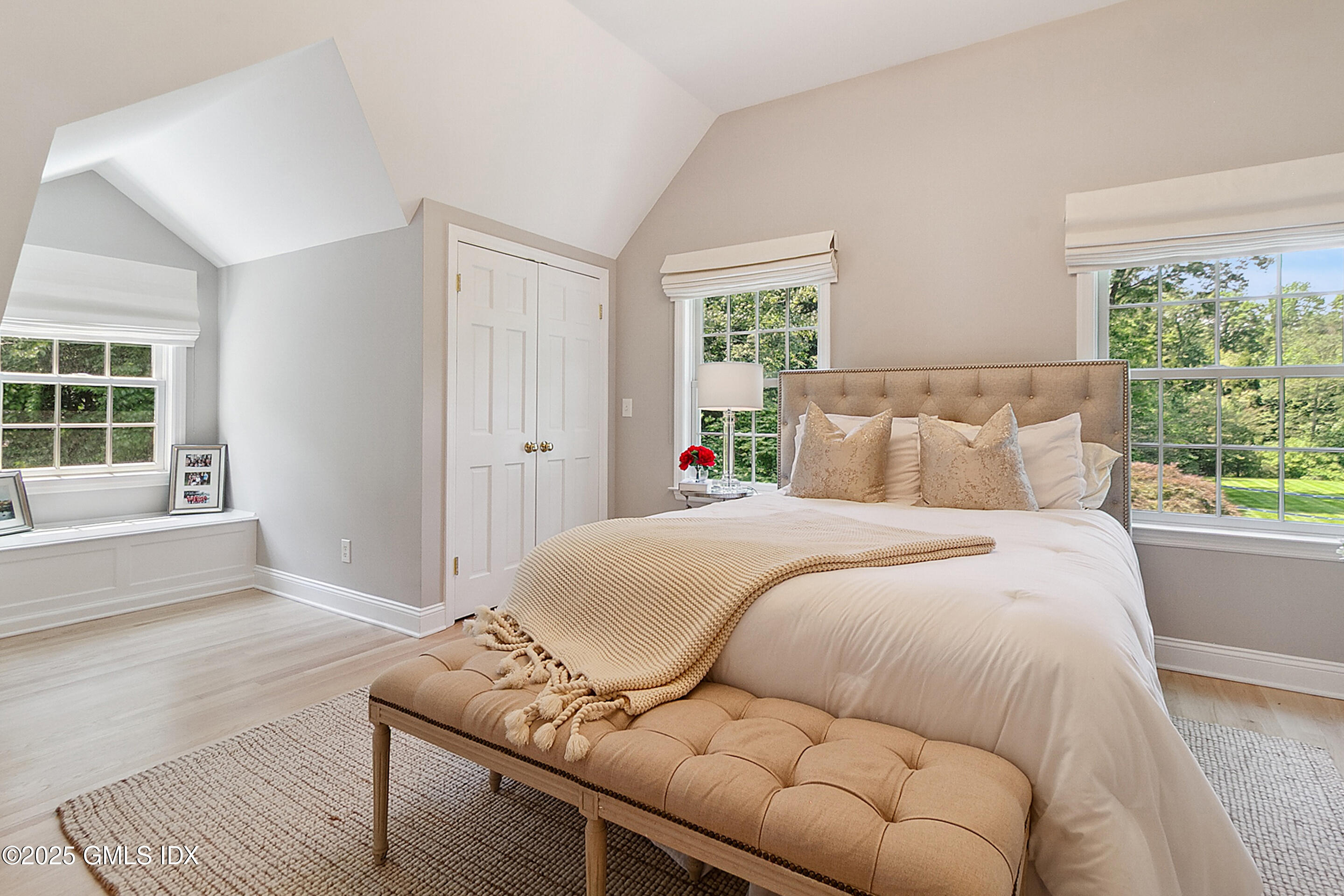 17 Will Merry Lane Greenwich, CT 06831 - Photo 34 of 49 a bedroom with a bed and window