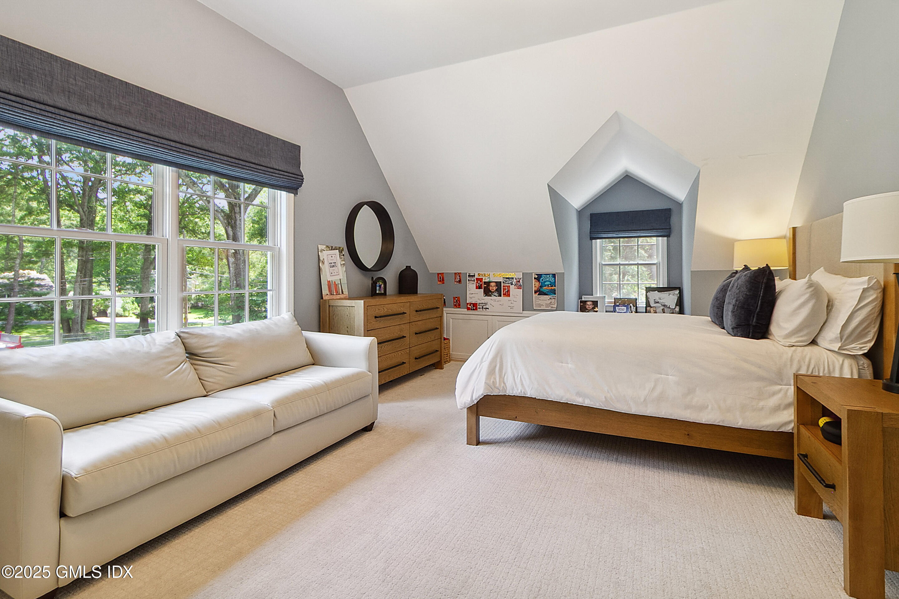 17 Will Merry Lane Greenwich, CT 06831 - Photo 35 of 49 a bedroom with bed and a large window