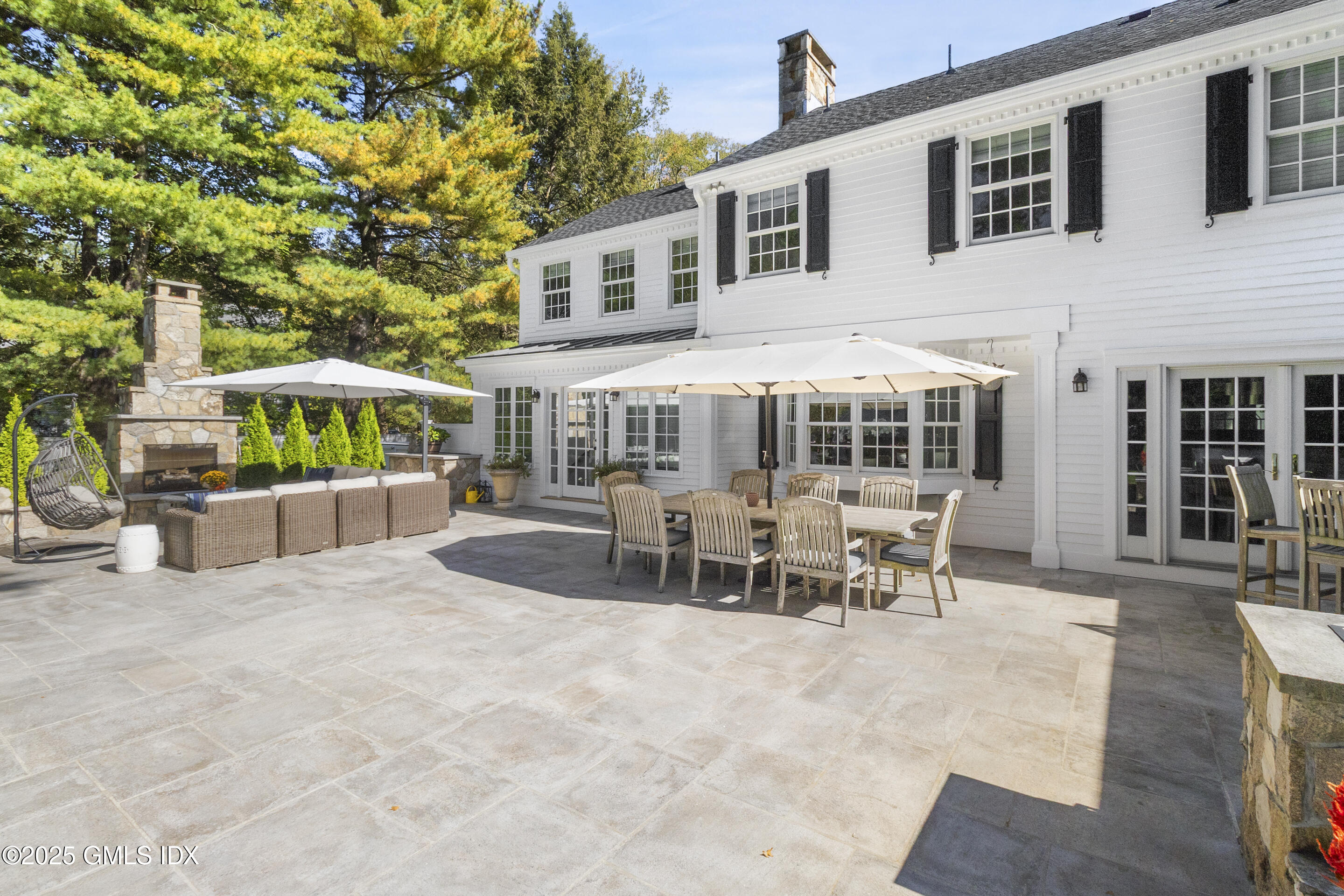 17 Will Merry Lane Greenwich, CT 06831 - Photo 45 of 49 a view of a house with sitting area and garden