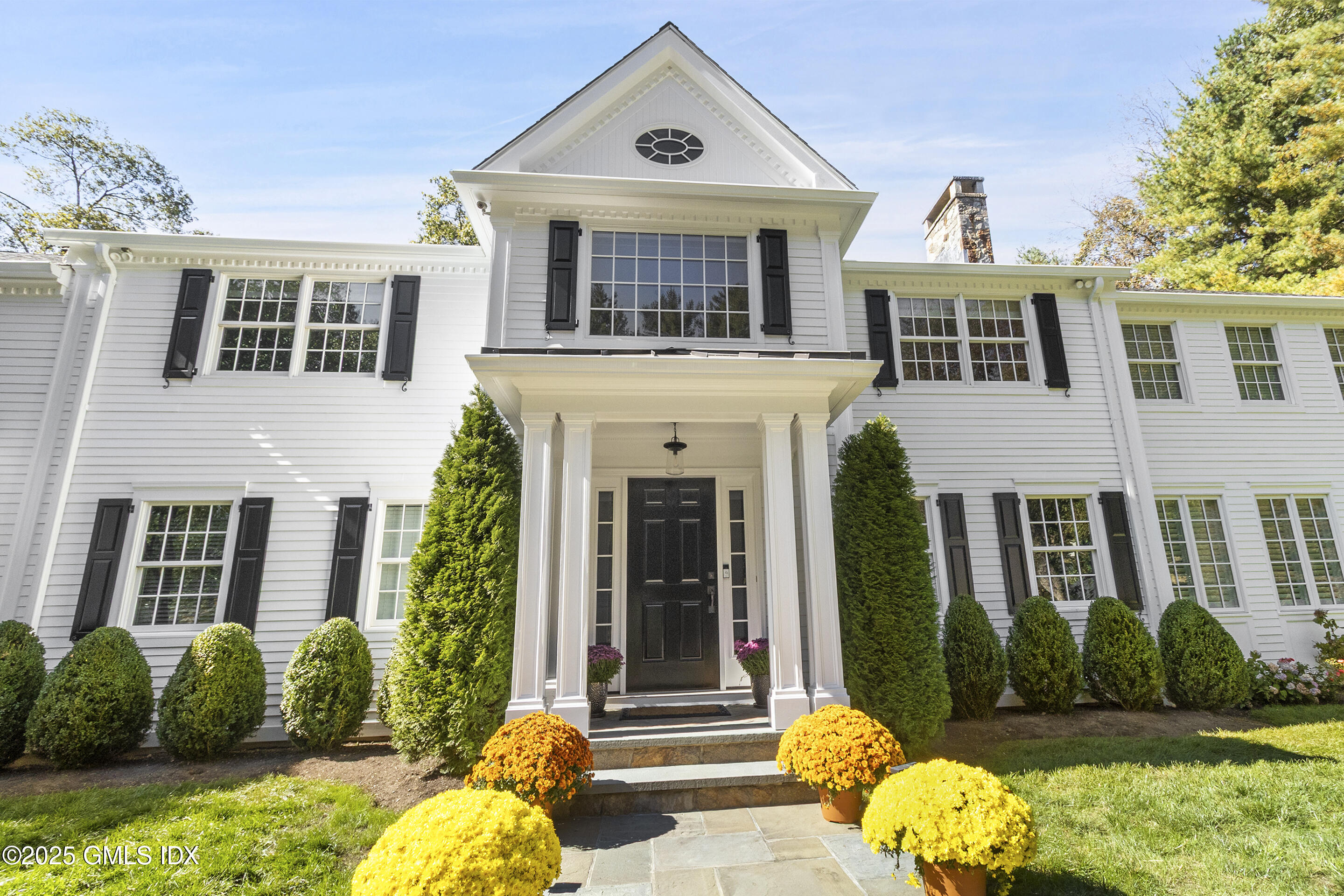 17 Will Merry Lane Greenwich, CT 06831 - Photo 5 of 49 front view of a house with a yard