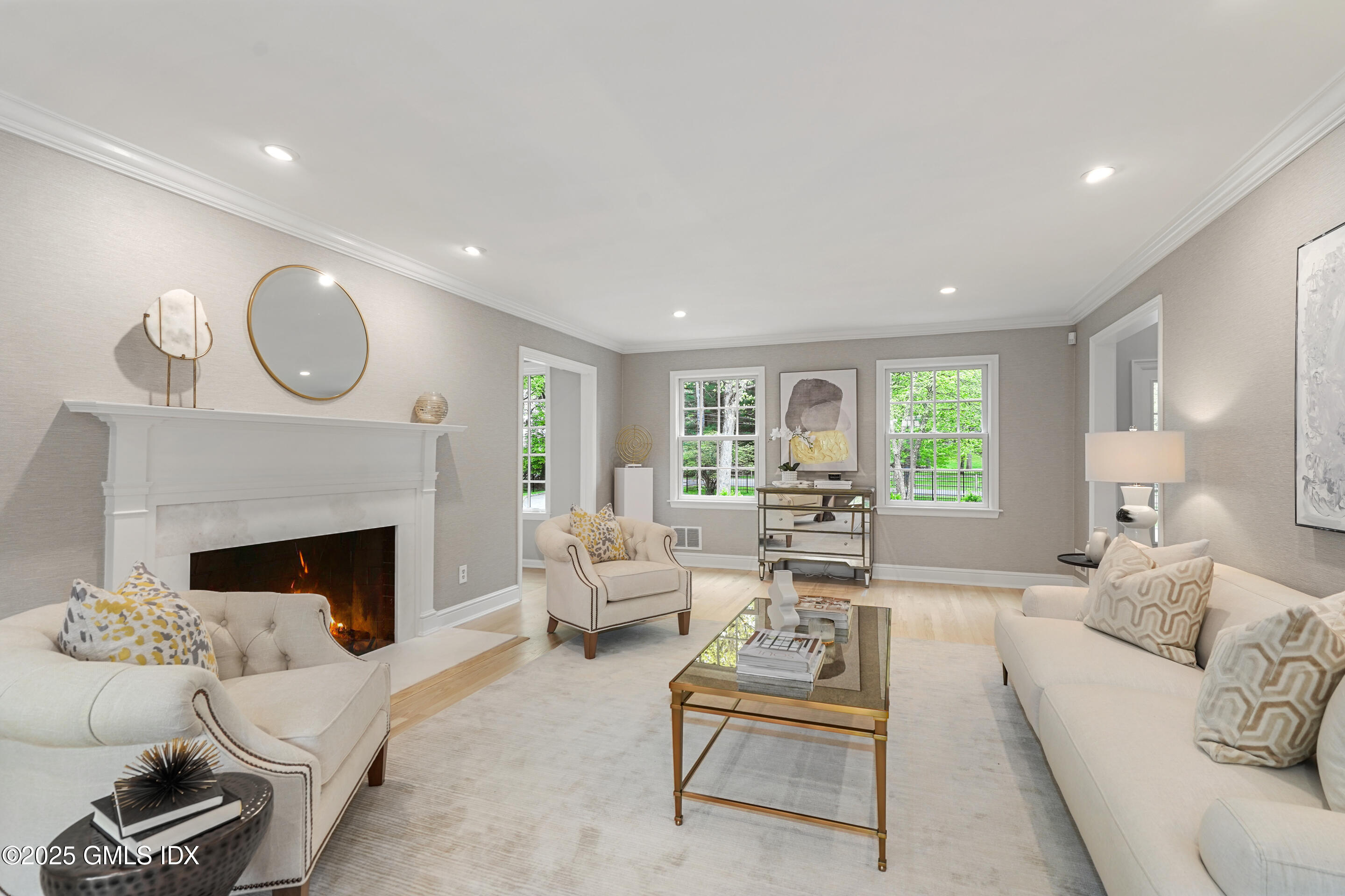 17 Will Merry Lane Greenwich, CT 06831 - Photo 9 of 49 a living room with furniture and a fireplace