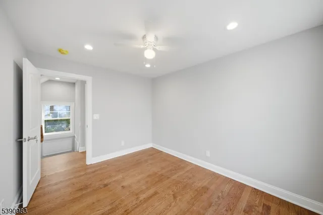 view of cabinet with a white wall