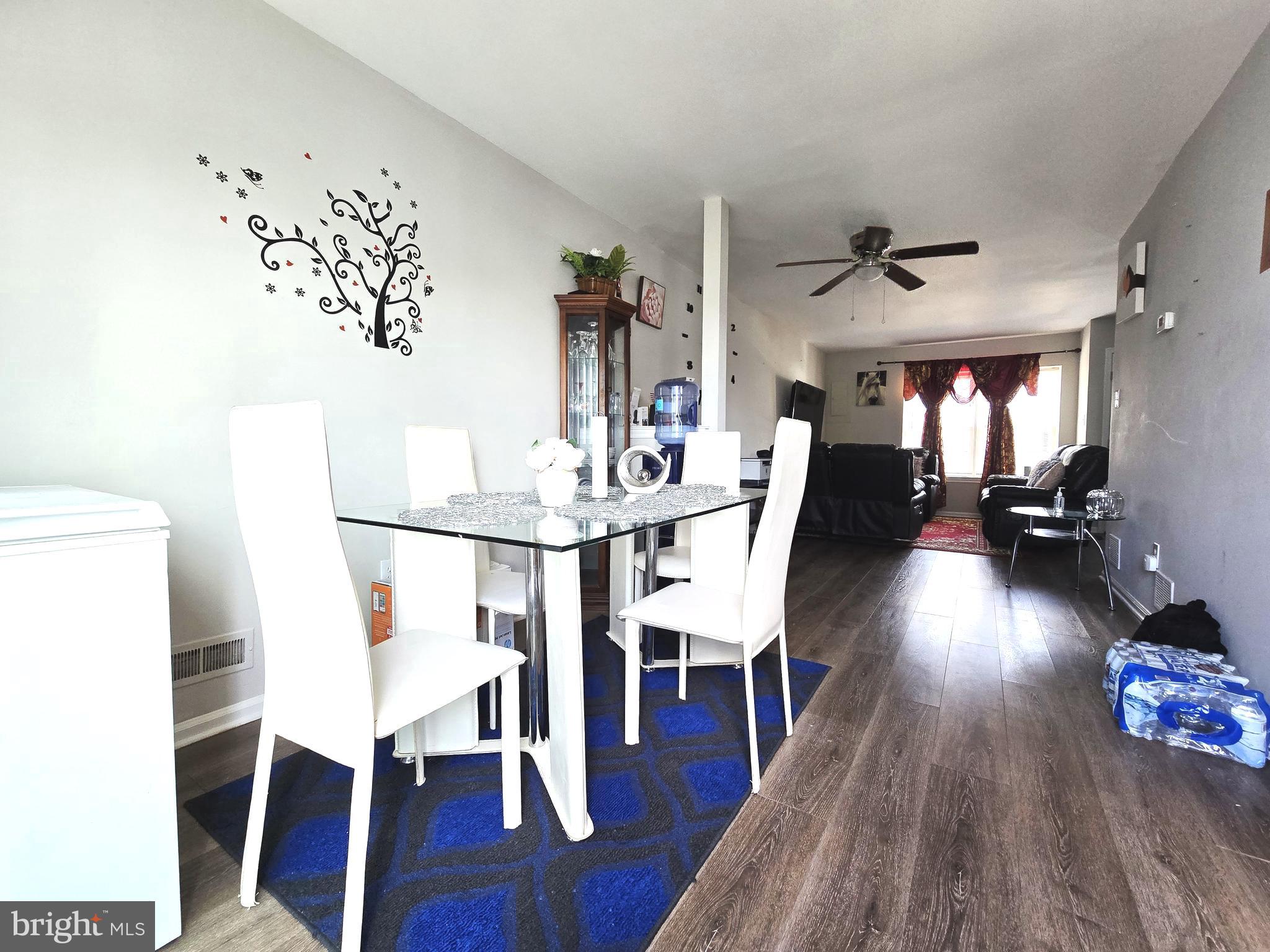 3 Arnold Place Newark, DE 19702 - Photo 12 of 28 a view of a dining room with furniture and wooden floor