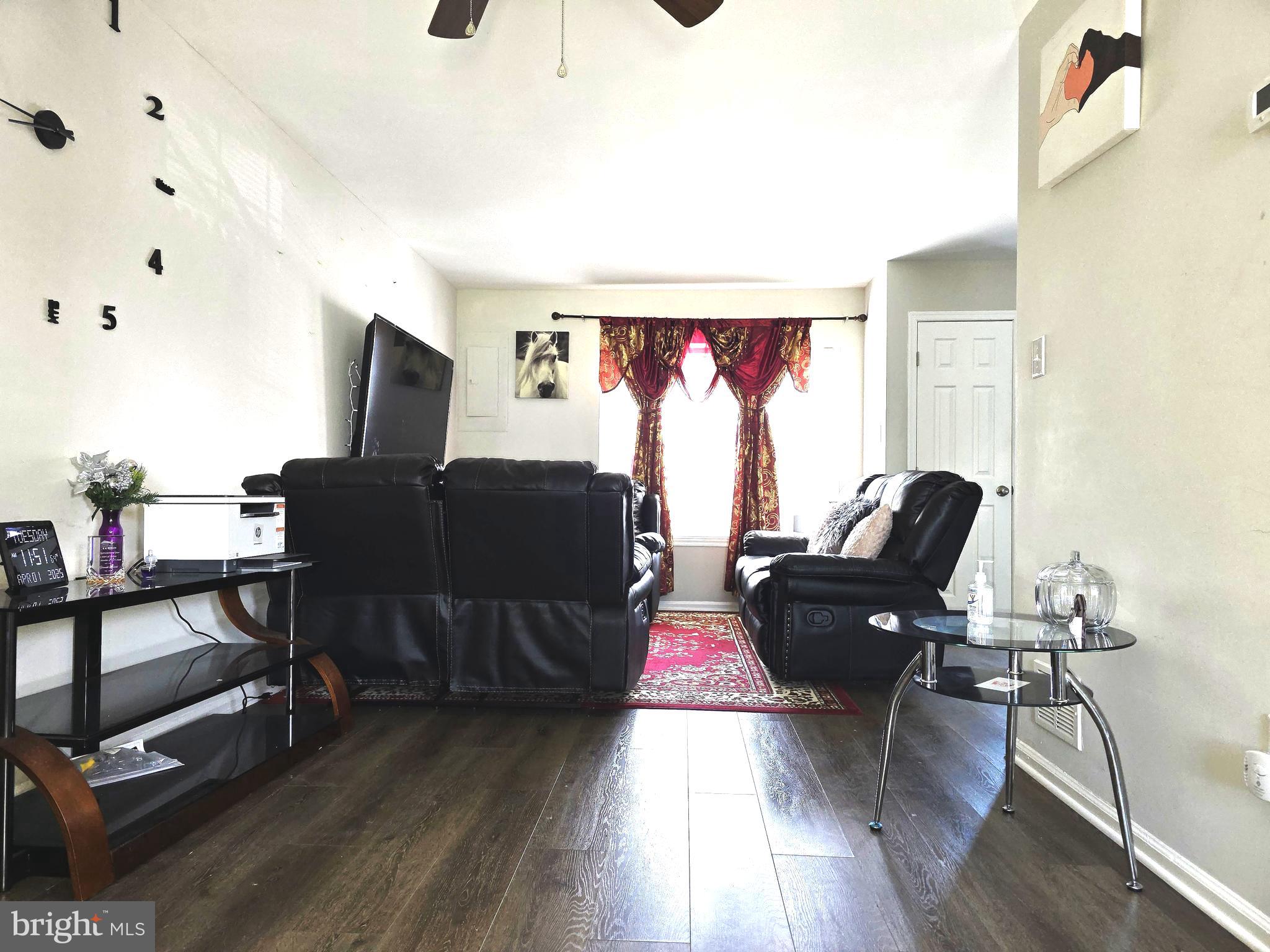 3 Arnold Place Newark, DE 19702 - Photo 13 of 28 a living room with furniture and a flat screen tv
