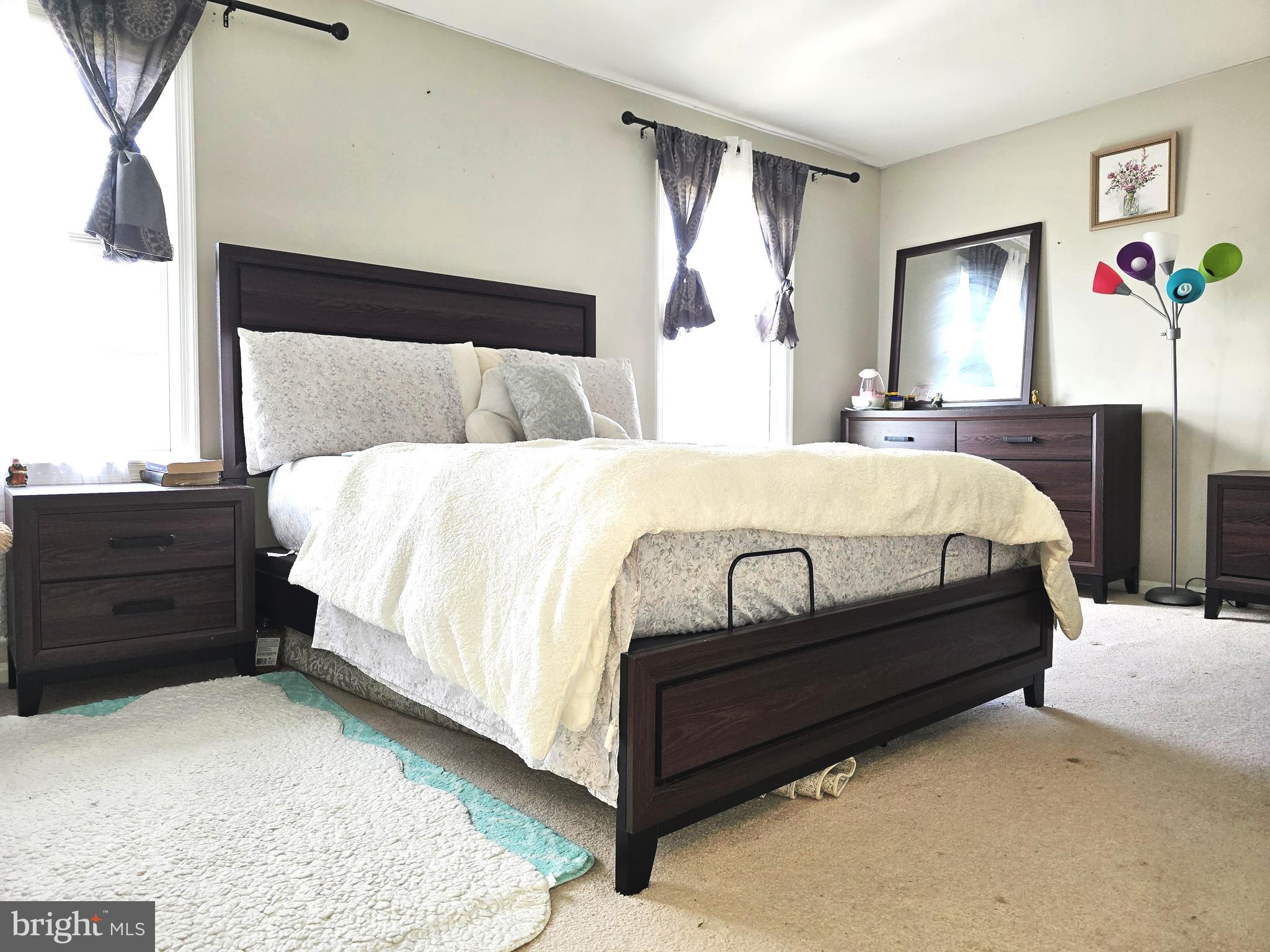 3 Arnold Place Newark, DE 19702 - Photo 14 of 28 a bedroom with a bed and a dresser