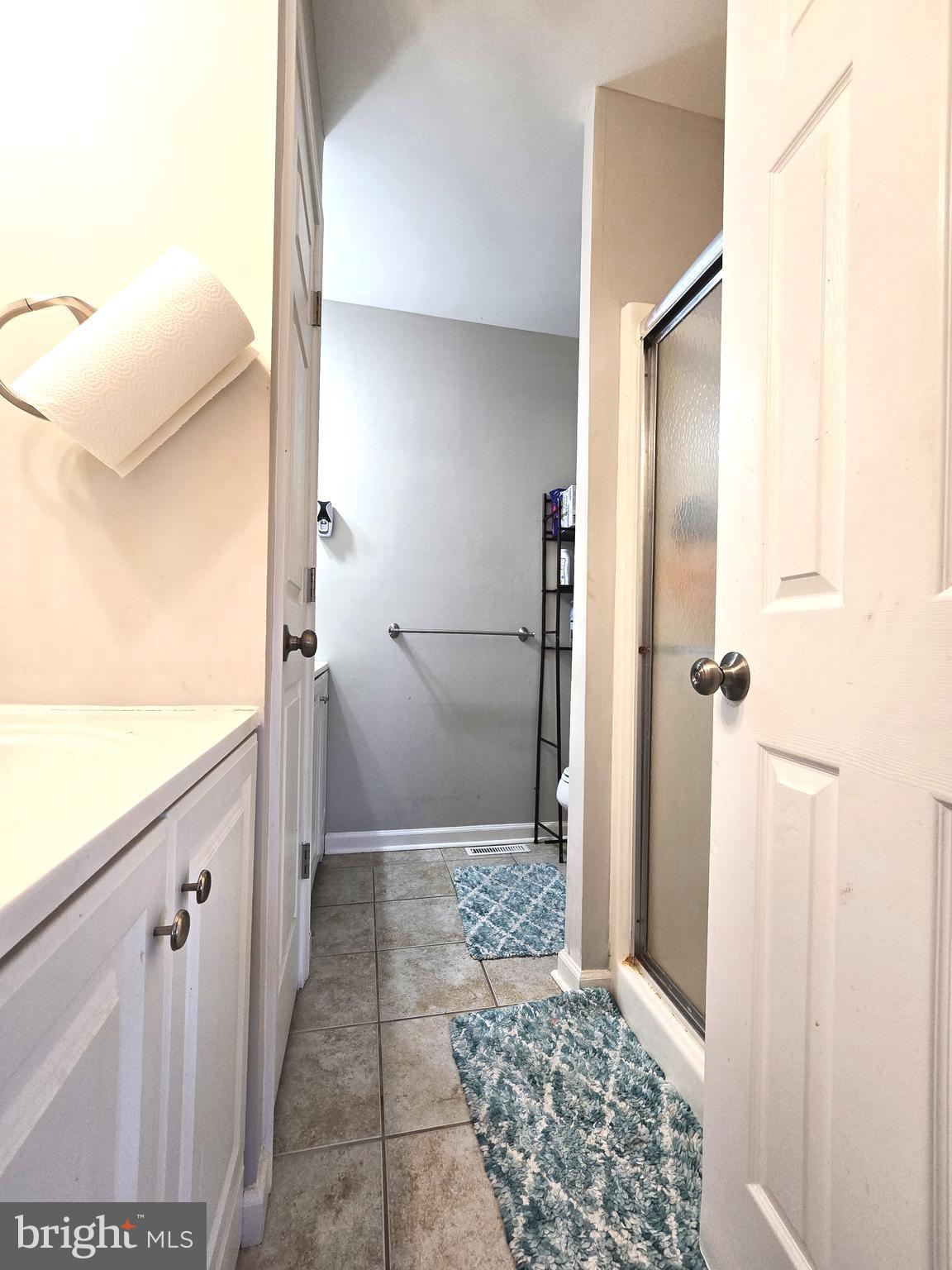 3 Arnold Place Newark, DE 19702 - Photo 16 of 28 a bathroom with a granite countertop shower