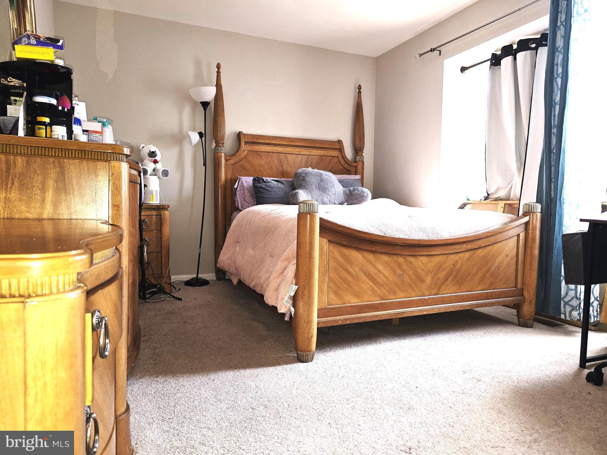 3 Arnold Place Newark, DE 19702 - Photo 20 of 28 a bedroom with a bed and a dresser
