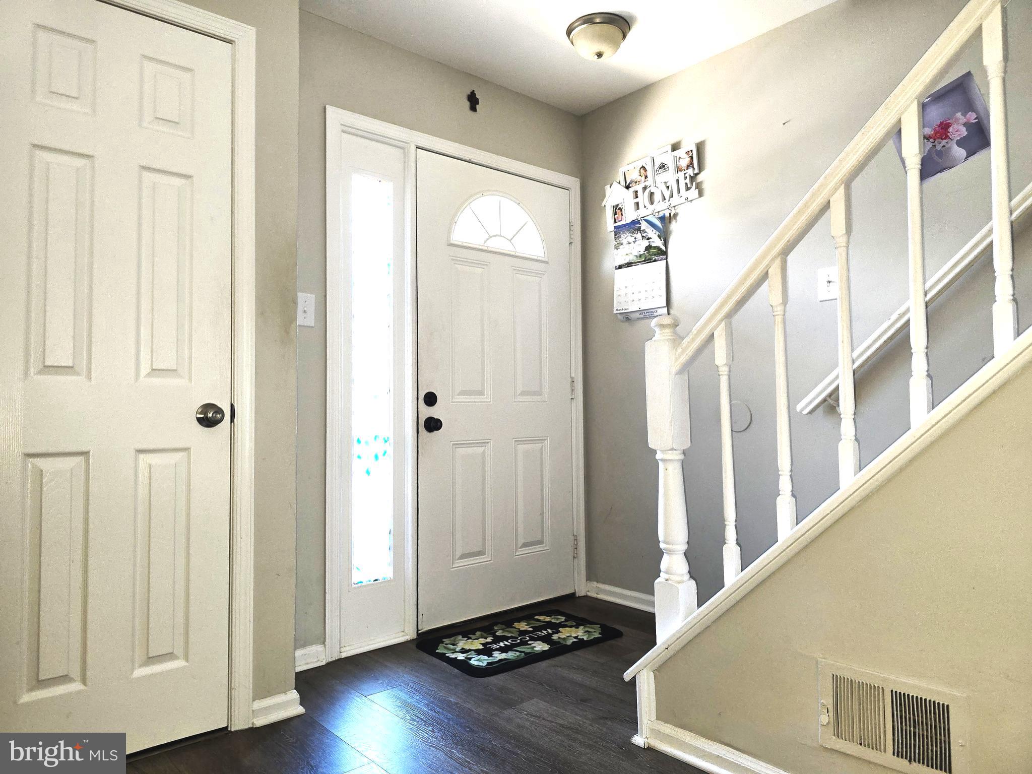3 Arnold Place Newark, DE 19702 - Photo 10 of 28 a view of an entryway with wooden floor