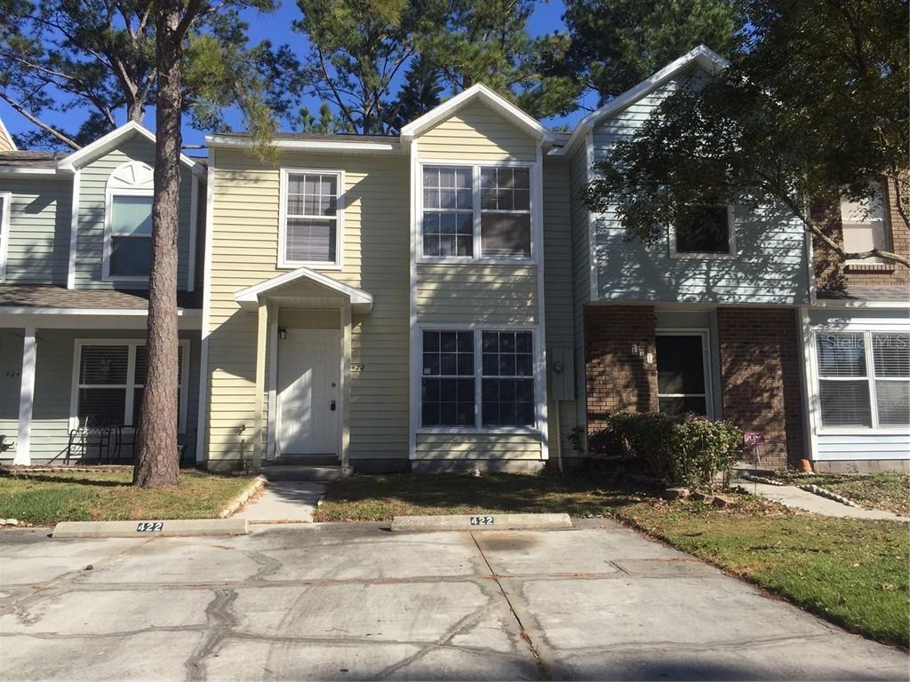 422 Green Spring Circle Winter Springs, FL 32708 - Photo 1 of 1 a front view of a house with a yard