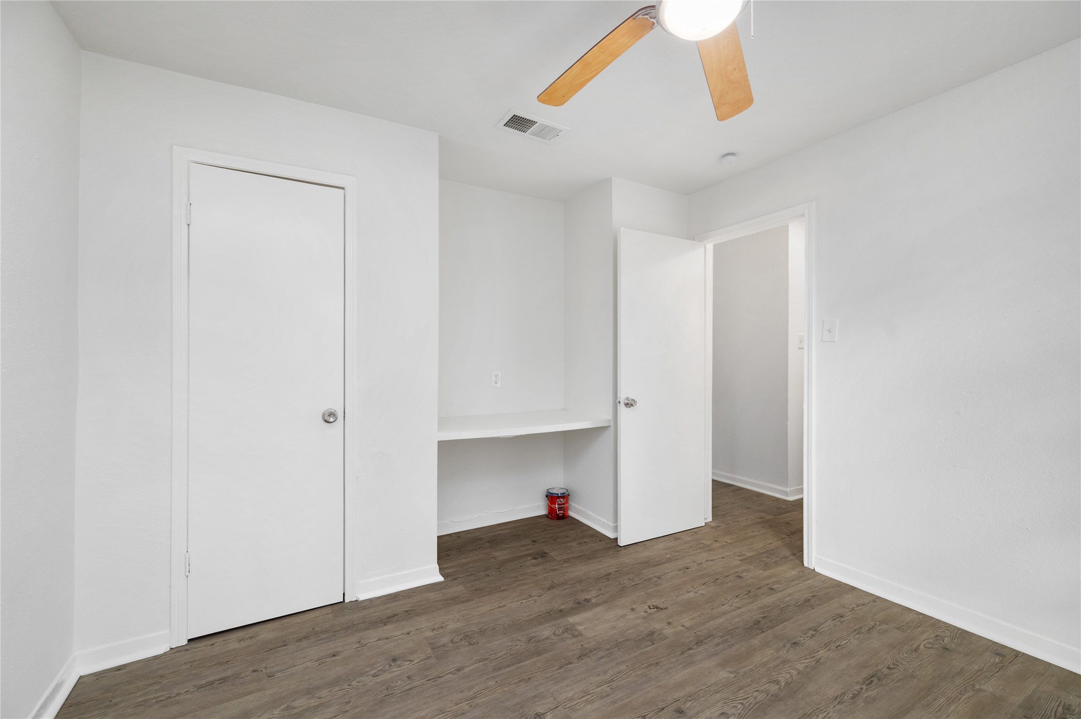 9322 Nyssa Street Houston, TX 77078 - Photo 26 of 34 a view of empty room with wooden floor