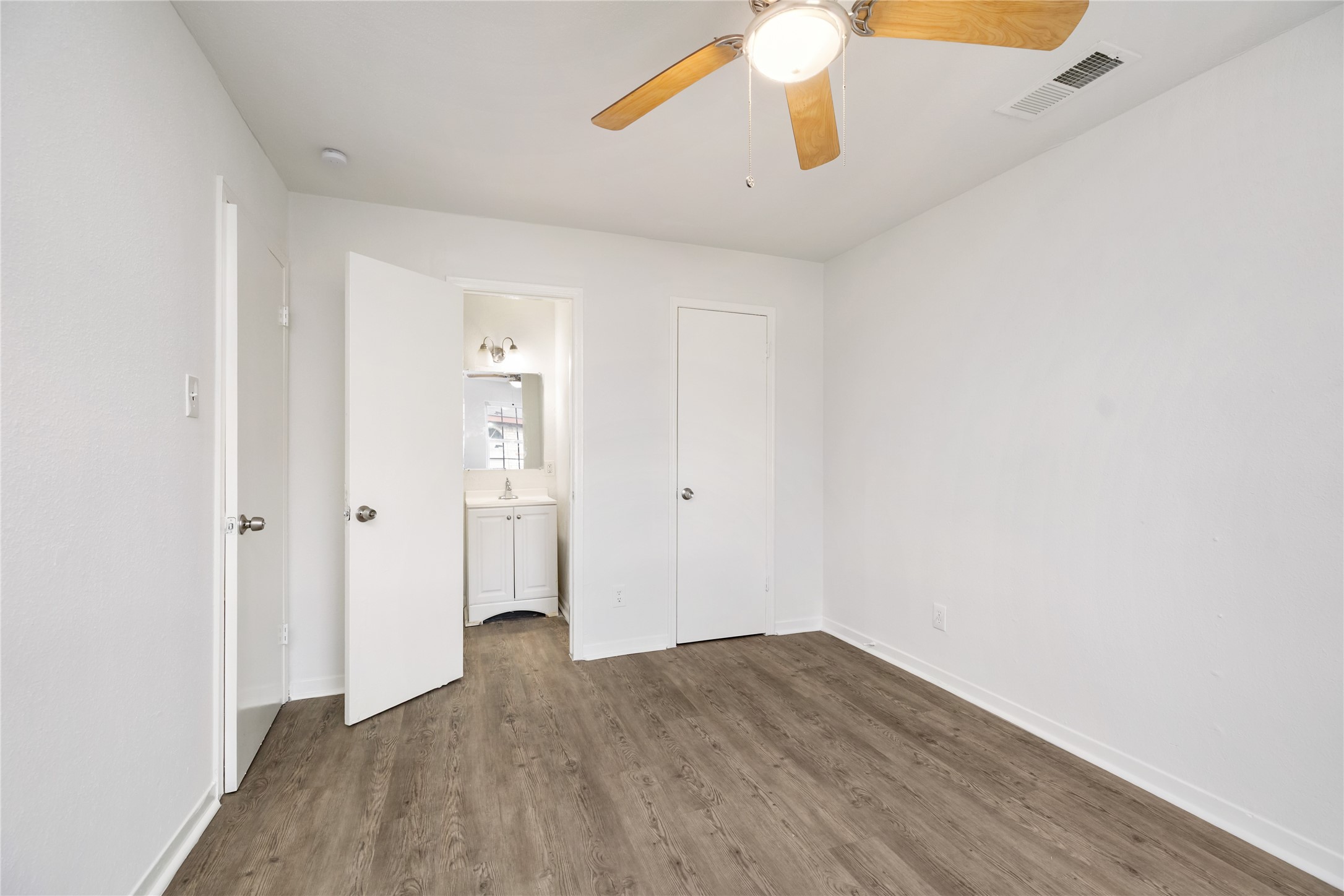 9322 Nyssa Street Houston, TX 77078 - Photo 31 of 34 wooden floor in an empty room