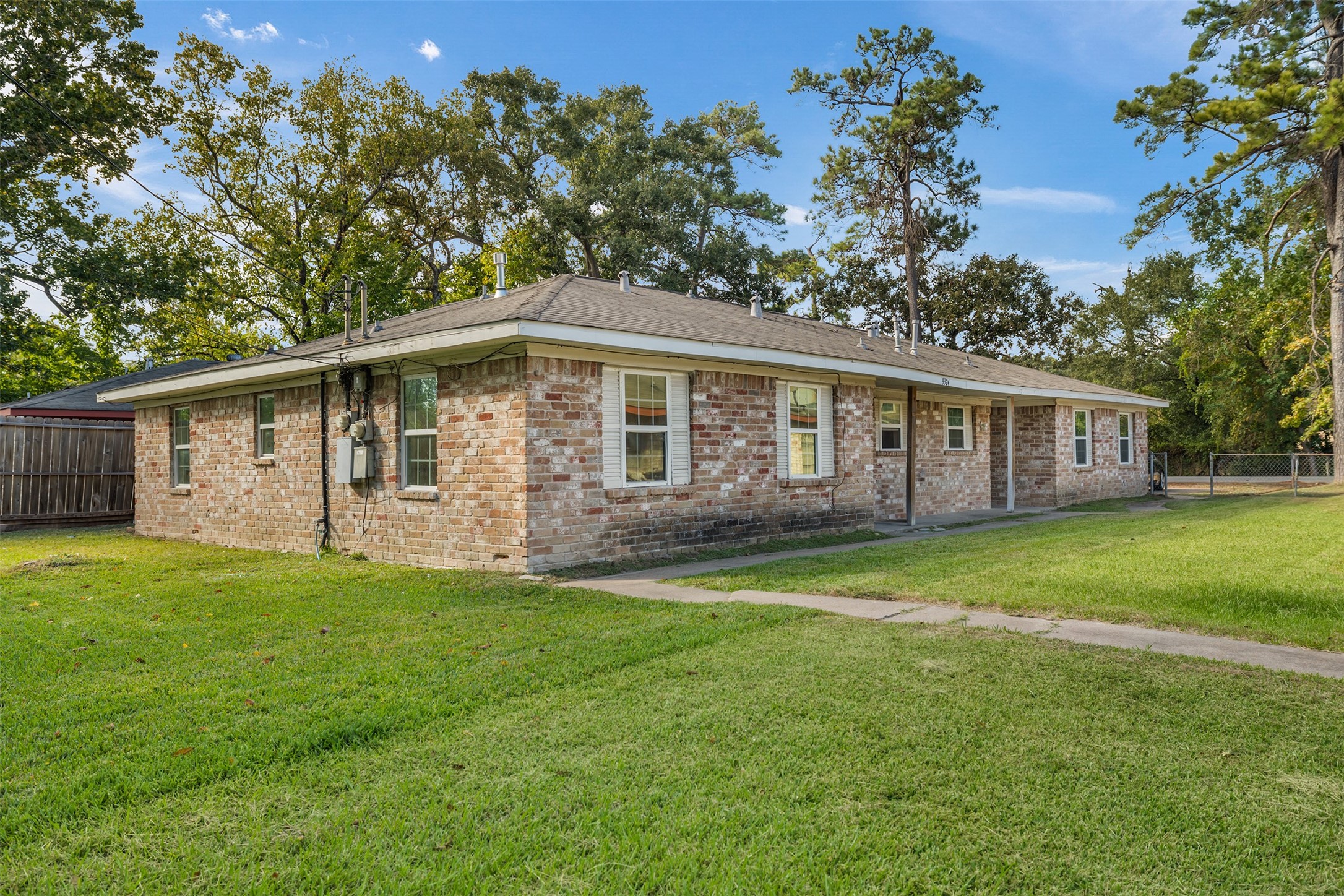 9322 Nyssa Street Houston, TX 77078 - Photo 33 of 34 a view of a house with a yard