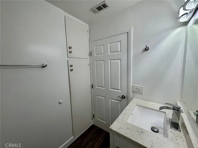a bathroom with a sink and tub