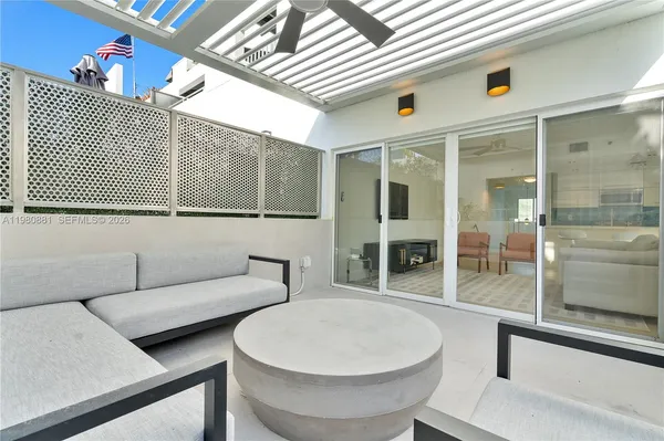 a bathroom with a toilet a sink and shower