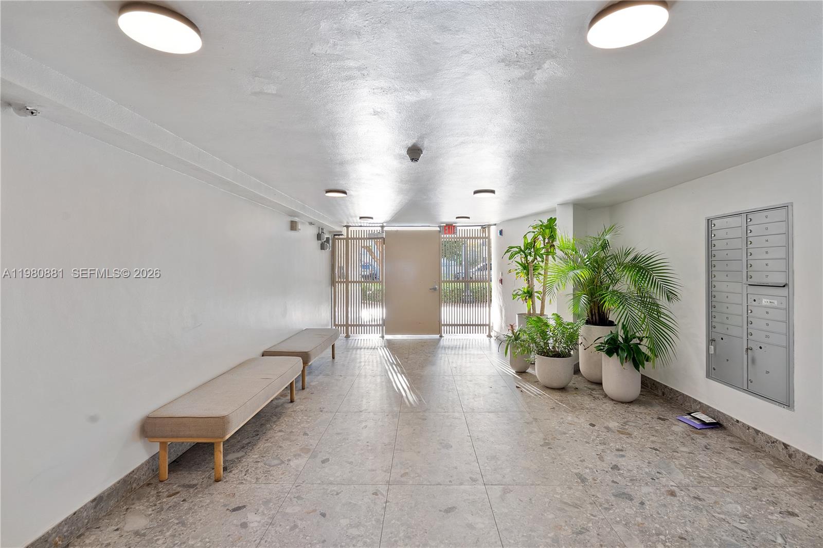 828 3rd Street, Unit 314 Miami Beach, FL 33139 - Photo 27 of 28 a view of a porch with a potted plant and couches