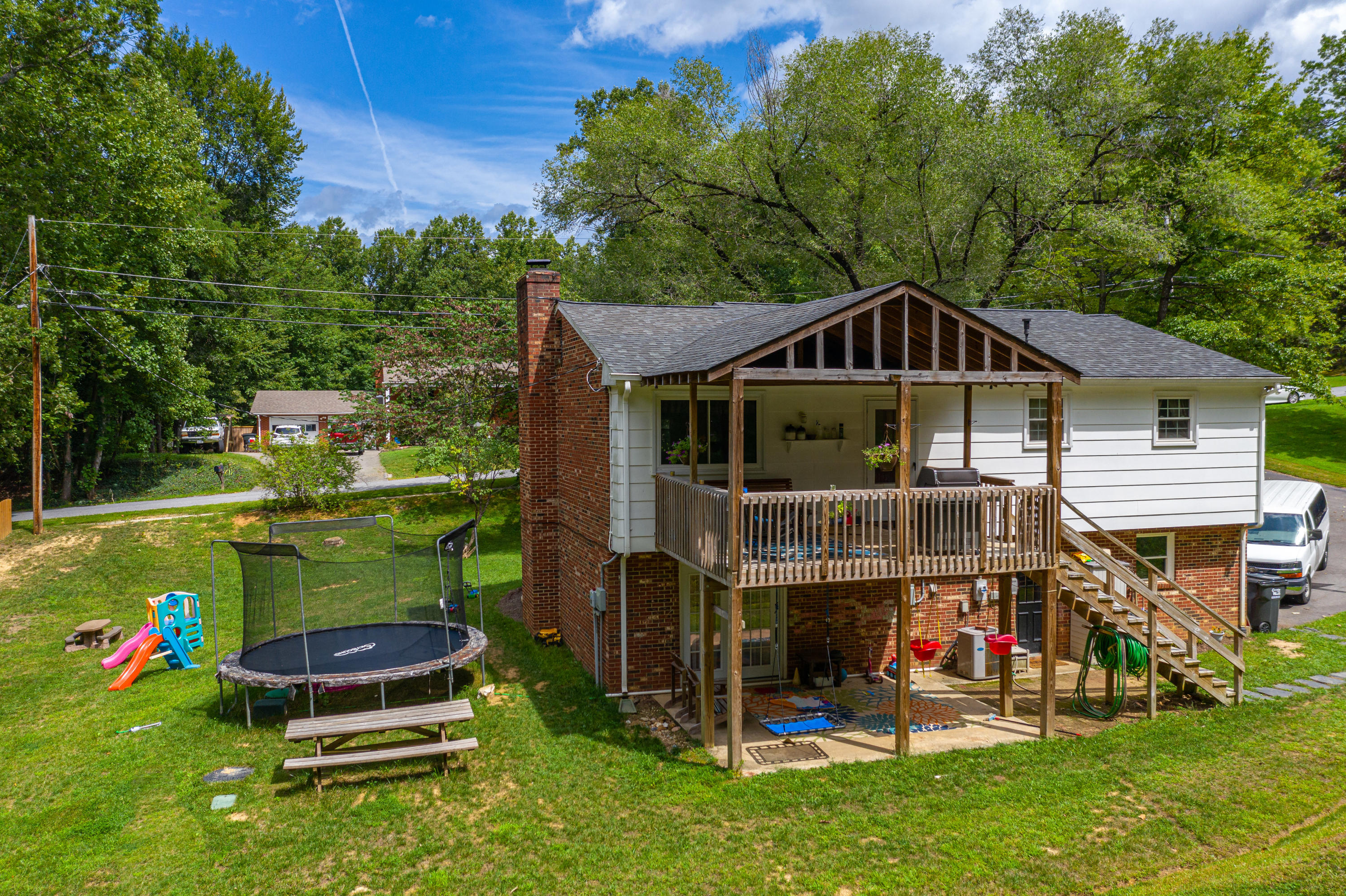 437 Pin Oak Drive Blue Ridge, VA 24064 - Photo 6 of 24 a front view of a house with garden