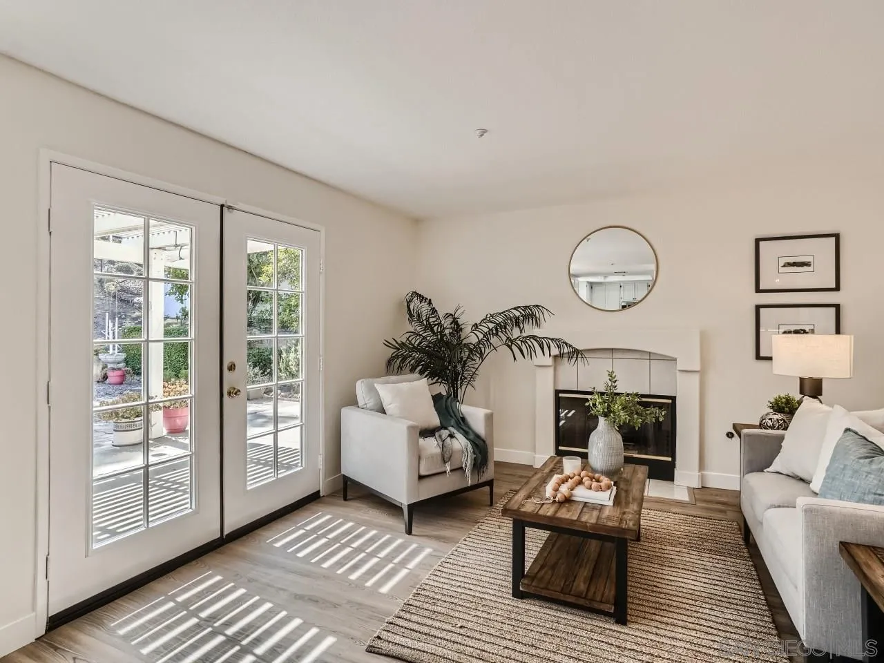 8515 Mesa Heights Road Santee, CA 92071 - Photo 13 of 28 a living room with furniture and a fireplace