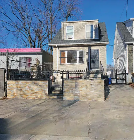 a swimming pool view with outdoor seating