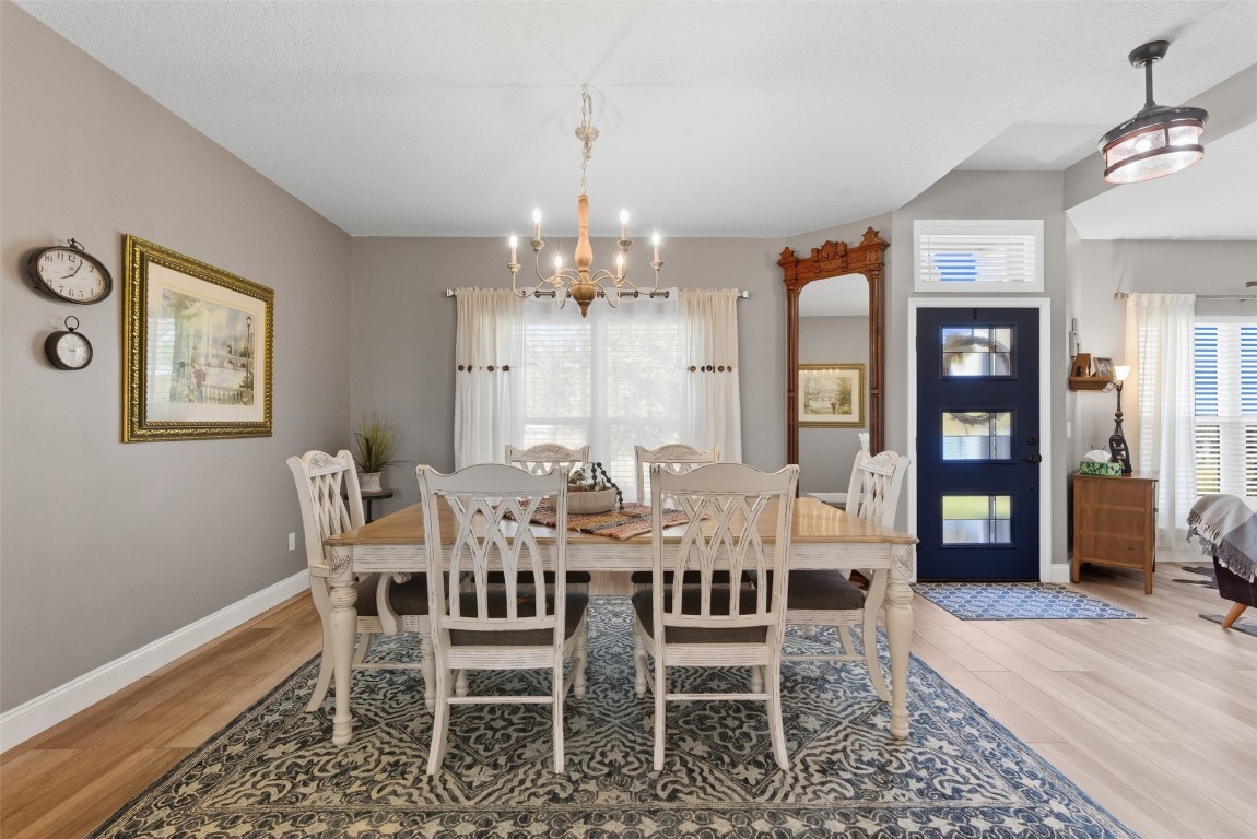 1250 Gum Leaf Road Jacksonville, FL 32226 - Photo 13 of 50 a view of a dining room with furniture and window