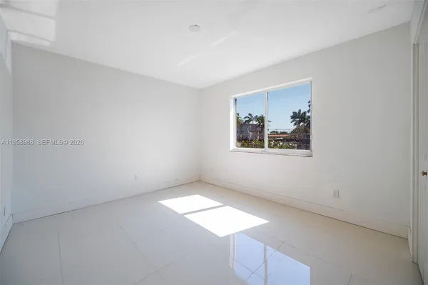 an empty room with windows