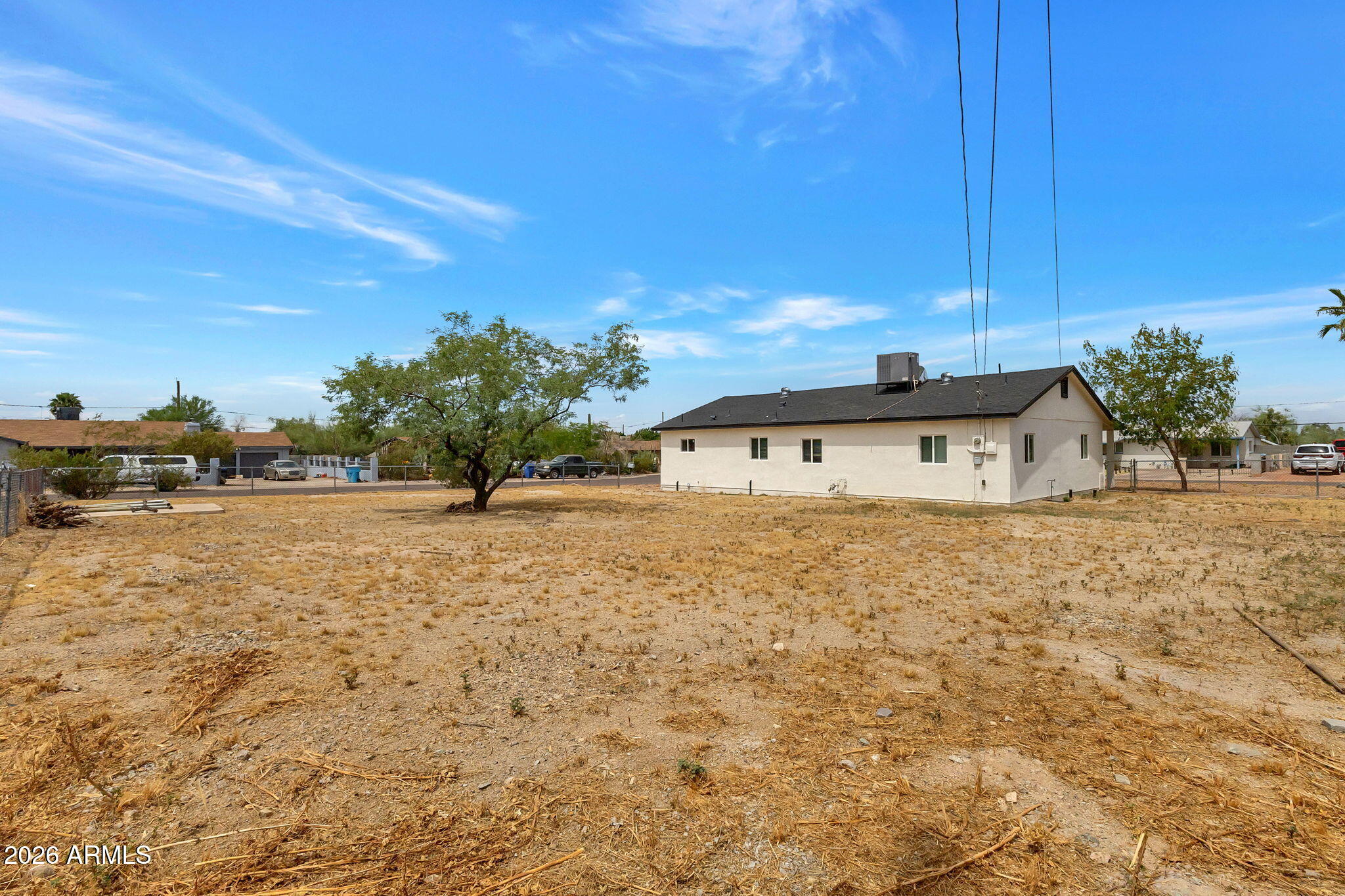 219 West Paseo Way Phoenix, AZ 85041 - Photo 14 of 14 a view of a house with a yard