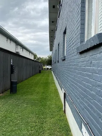 a view of a back yard of the house