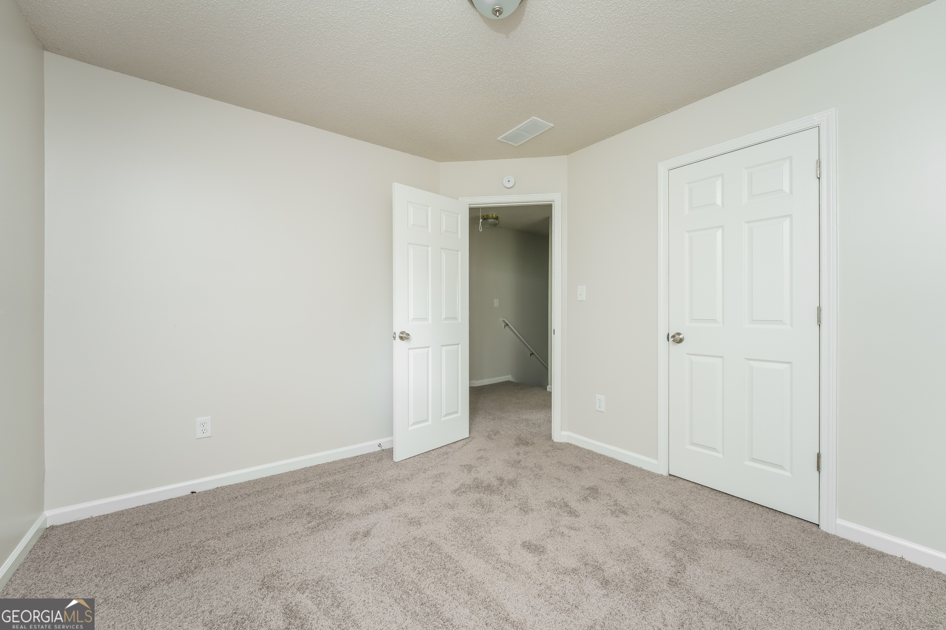 6930 Red Bone Way Lithonia, GA 30038 - Photo 11 of 17 an empty room with closet area