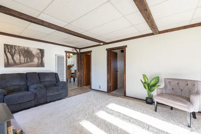 a living room with furniture and a couch