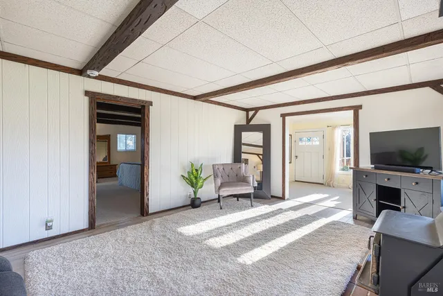 a bedroom with furniture and a bed