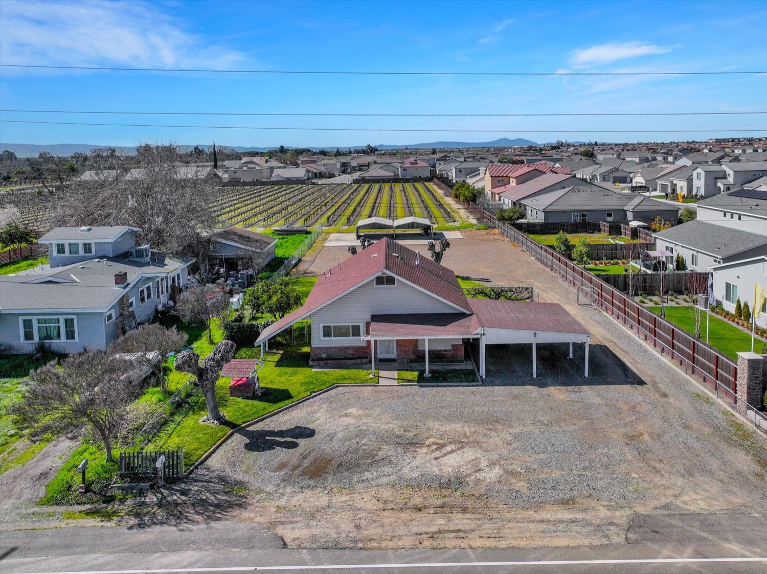 20757 South Union Road Manteca, CA 95337 - Photo 1 of 1 a aerial view of a house with a garden