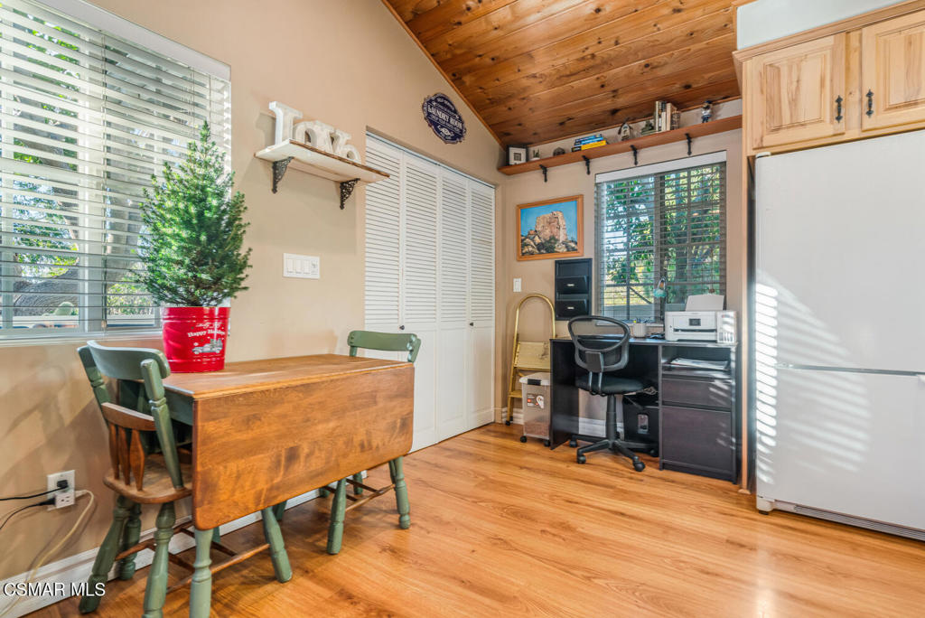 1088 Alta Vista Road Simi Valley, CA 93063 - Photo 11 of 24 a dining room with furniture and wooden floor