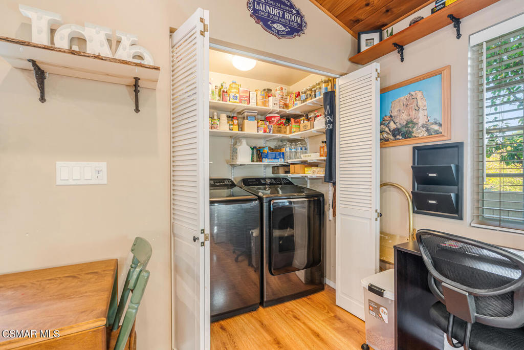 1088 Alta Vista Road Simi Valley, CA 93063 - Photo 16 of 24 a kitchen with stainless steel appliances granite countertop a sink and a refrigerator