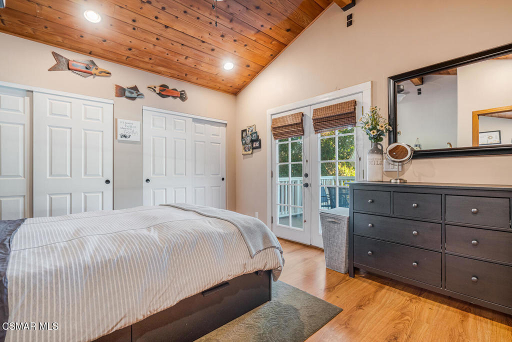 1088 Alta Vista Road Simi Valley, CA 93063 - Photo 19 of 24 a bedroom with a large bed and a dresser