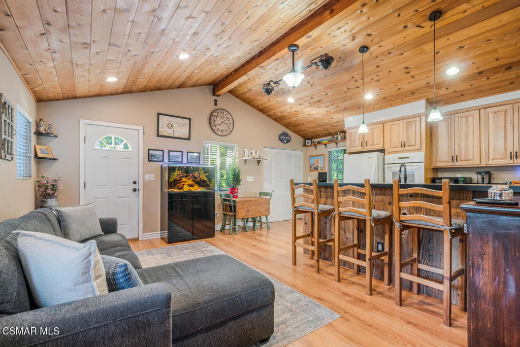 1088 Alta Vista Road Simi Valley, CA 93063 - Photo 9 of 24 a living room with furniture kitchen view and a large window