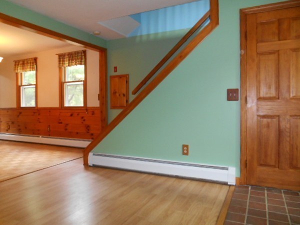 8 Victoria Avenue Rutland, MA 01543 - Photo 12 of 30 an empty room with wooden floor and windows