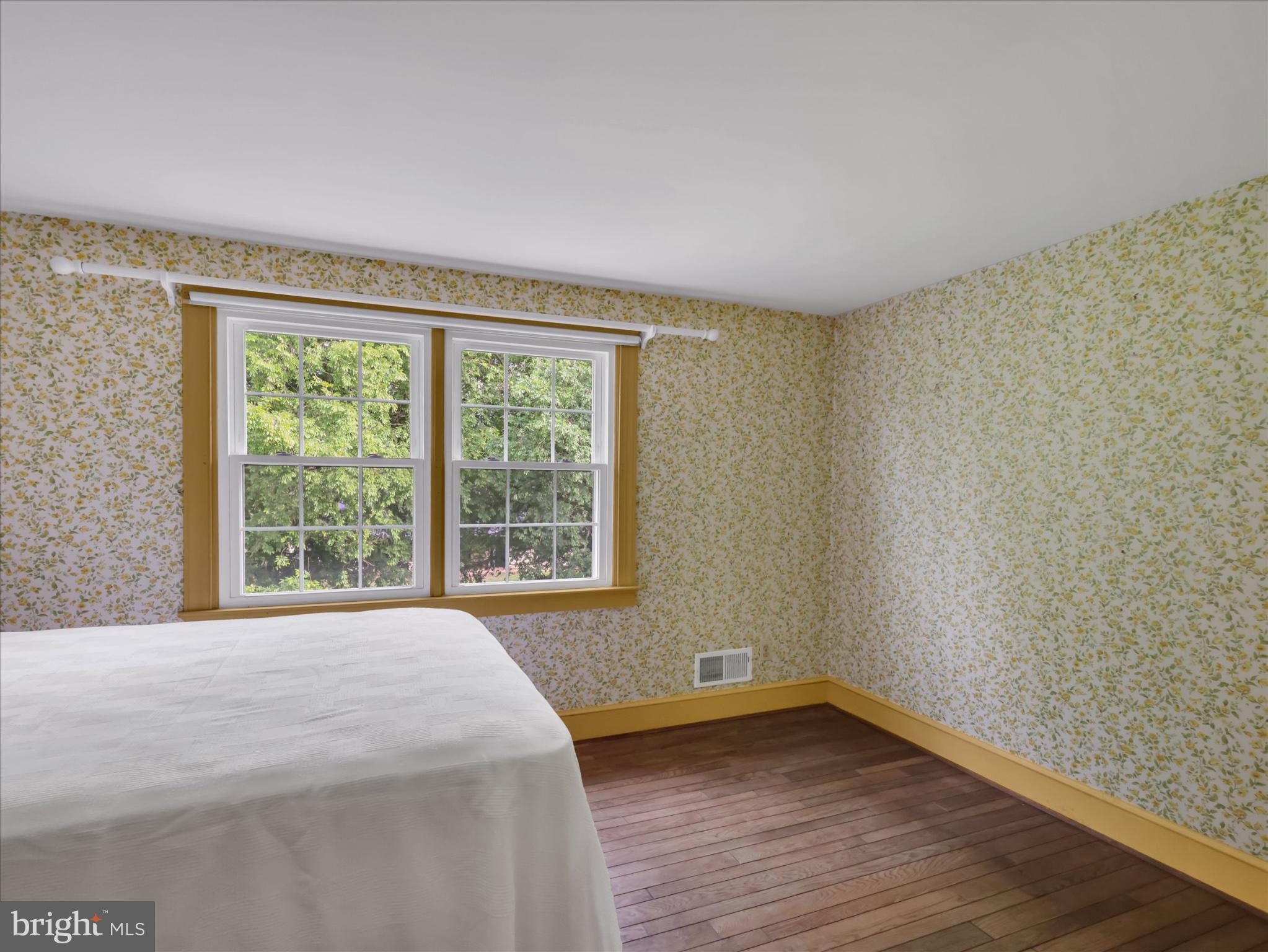 19255 Telegraph Springs Road Purcellville, VA 20132 - Photo 38 of 107 a view of a room with wooden floor and a window