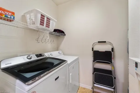 a dining room with a table and chairs