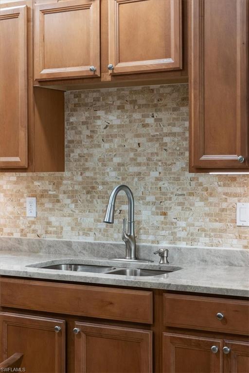 14981 Reflection Key Circle, Unit 322 Fort Myers, FL 33907 - Photo 25 of 35 a sink with window