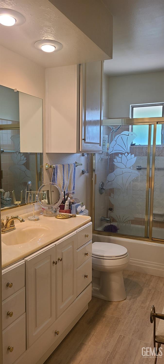 Undisclosed Address Bakersfield, CA 93309 - Photo 11 of 18 a bathroom with a double vanity sink toilet and shower