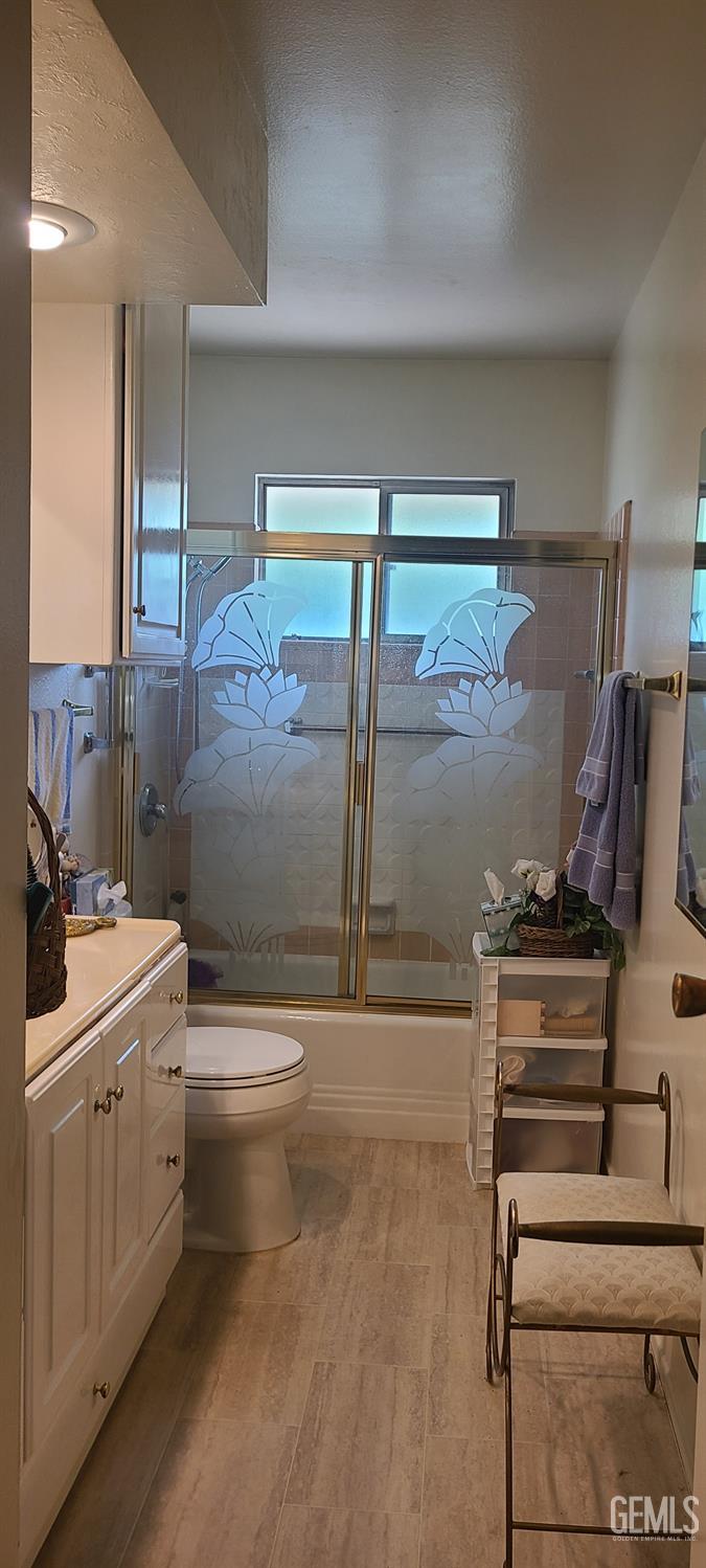 Undisclosed Address Bakersfield, CA 93309 - Photo 12 of 18 a bathroom with a sink and mirror