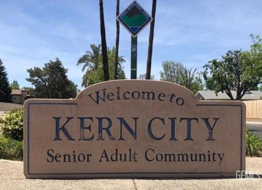 Undisclosed Address Bakersfield, CA 93309 - Photo 18 of 18 a view of outdoor space with sign board and garden