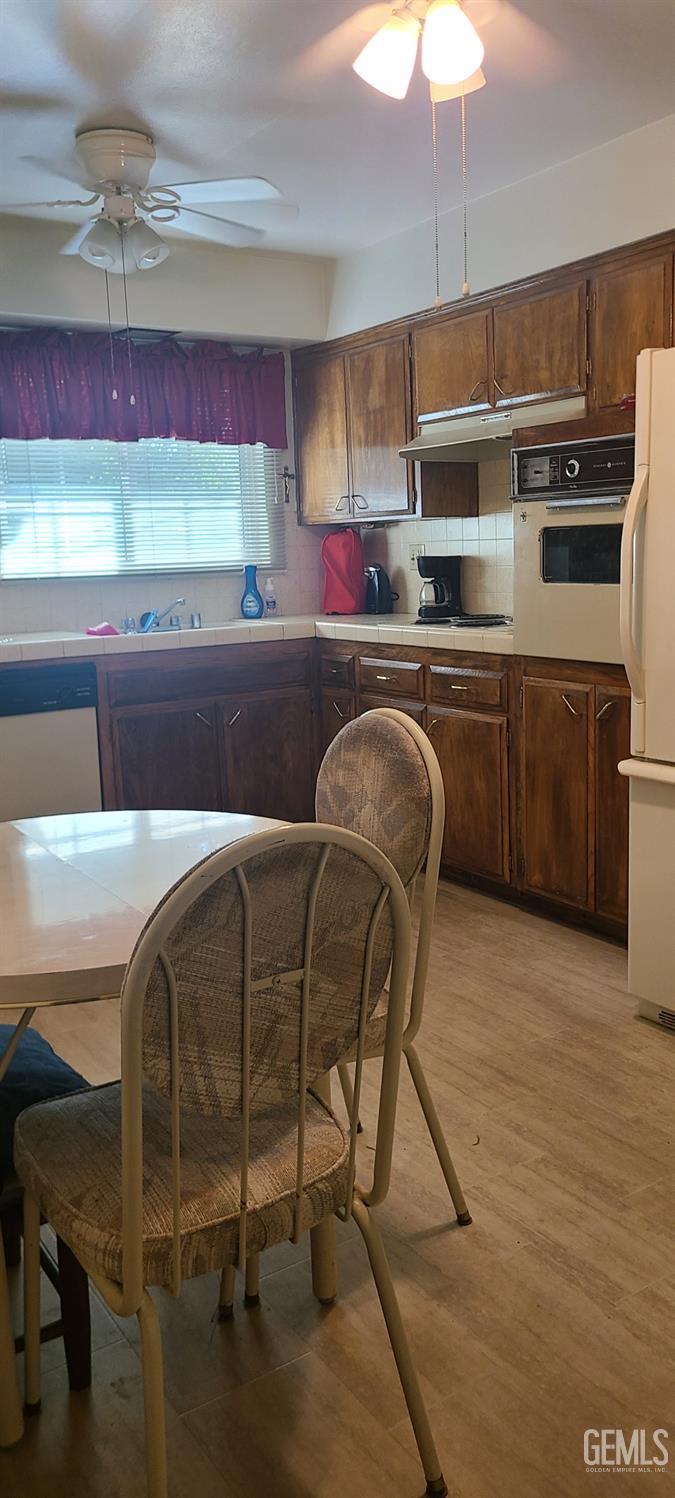 Undisclosed Address Bakersfield, CA 93309 - Photo 7 of 18 a kitchen with a sink cabinets and window