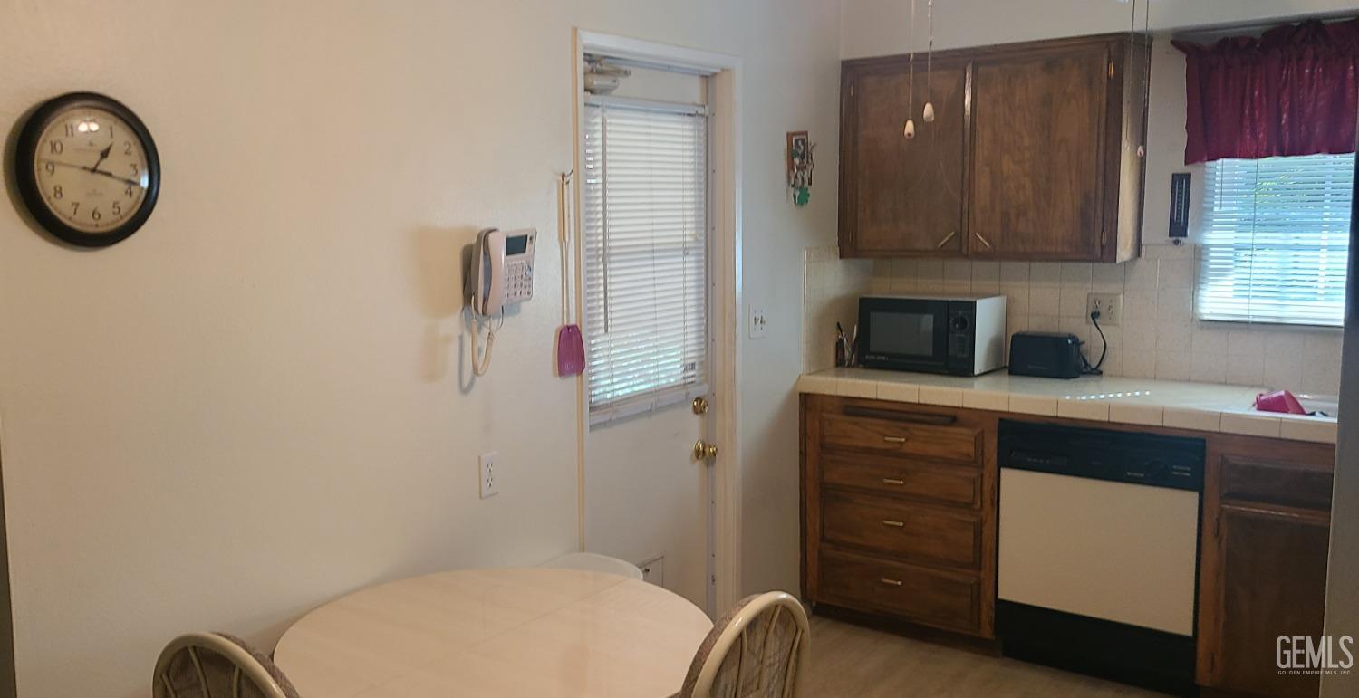 Undisclosed Address Bakersfield, CA 93309 - Photo 8 of 18 a bathroom with a toilet and a sink