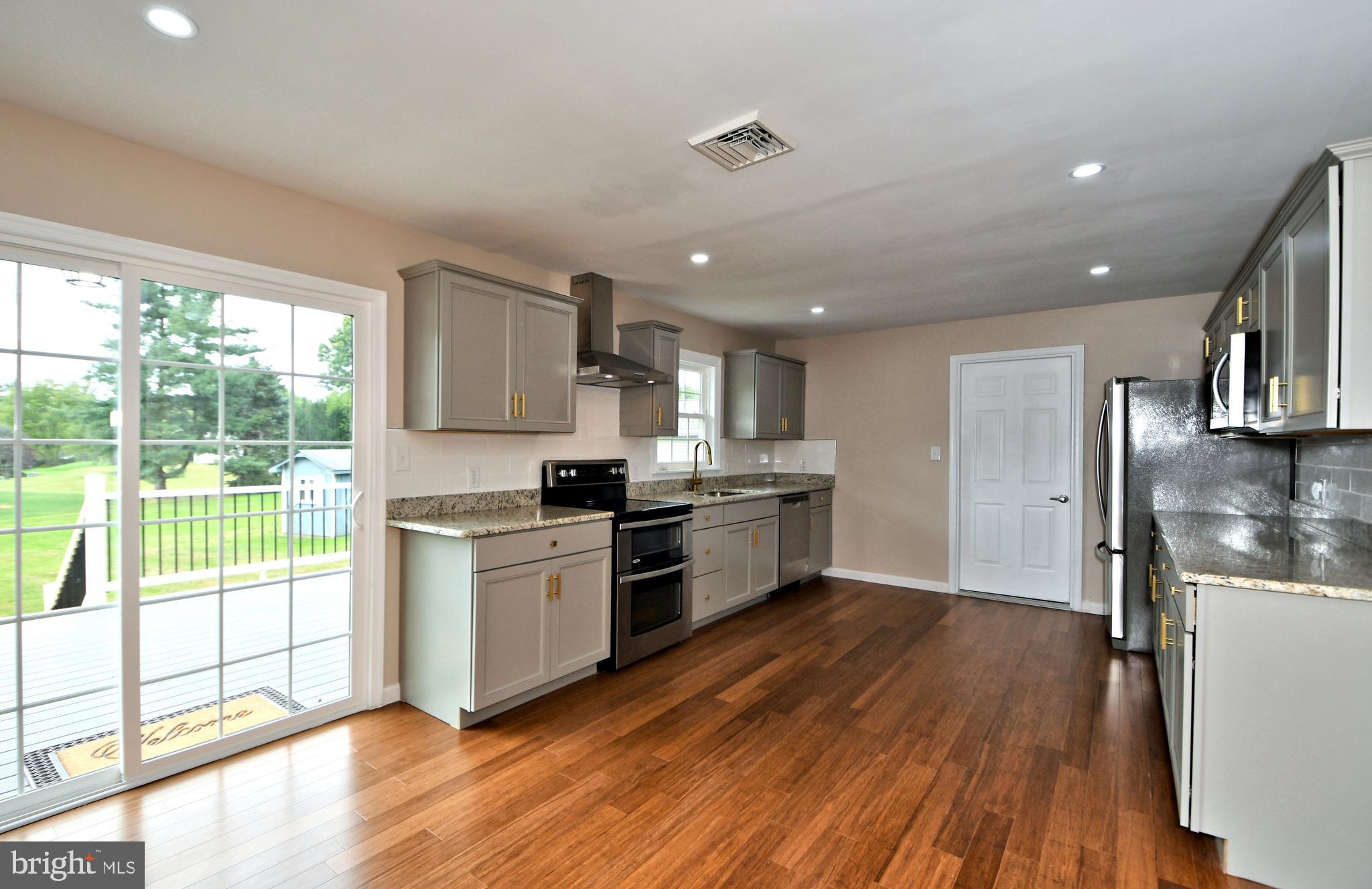 412 Allentown Road Souderton, PA 18964 - Photo 20 of 80 Dining Area with Sliders Out to Rear Deck